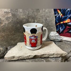Red and White Ceramic Mug with British Royal Guard Design